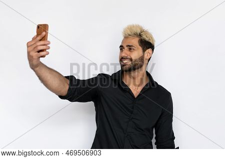 Cheerful Young Man Taking Selfie. Male Caucasian Model With Brown Eyes, Ombre Painted Hair And Beard