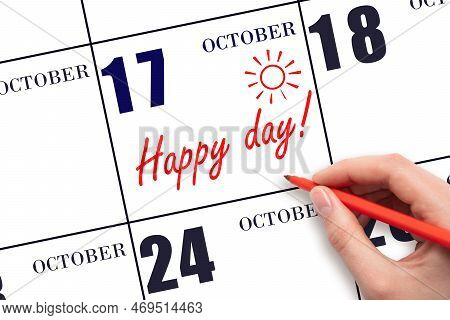 17th Day Of October. Hand Writing The Text Happy Day And Drawing The Sun On The Calendar Date Octobe
