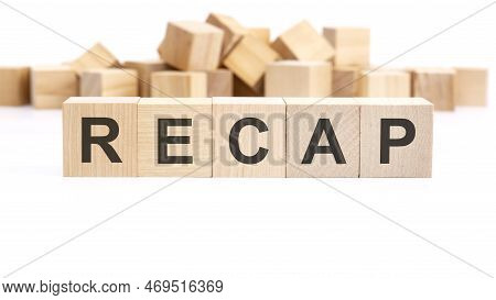 Text Recap Made Of Wooden Cubes And Different Words On White Background