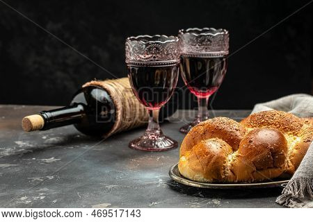 Shabbat Shalom Challah Bread, Shabbat Wine On A Dark Background, Place For Text, Top View,