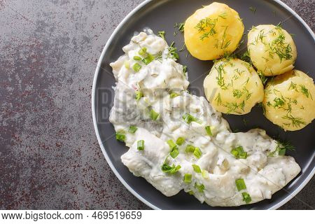 Herring Fillet With Apples, Pickles, Onions In A Creamy Sauce With A Side Dish Of Boiled Potatoes Cl