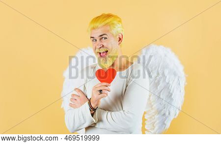 Bearded Man In Angelic Wings With Red Paper Heart. Valentines Day Card. Valentine Cupid Angel.