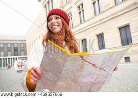 Redhead Girl, Tourist Explores City, Looks At Paper Map To Find Way For Historical Landmarks, Woman 