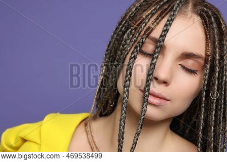 Beautiful Woman With Long African Braids On Purple Background, Closeup. Space For Text