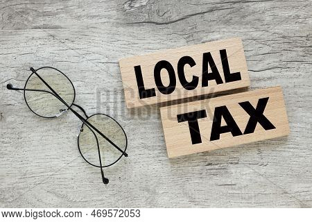 Local. On Wooden Blocks. The Concept Of Business, Finance, Credit, Tax , Real Estate, Home, Housing