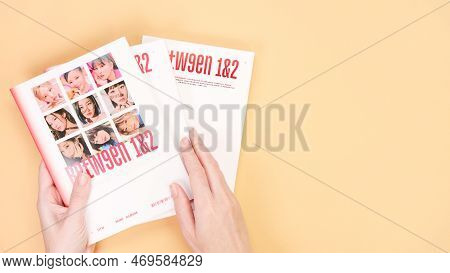 Hands Holding Twice Between 1 And 2 Mini Album Box Set On Yellow. Music Cd. South Korean Girl Group