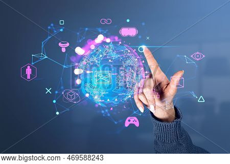 Woman Finger Touch Earth Sphere Hologram With Glowing Virtual Reality Icons, Nft And Cryptoart With 