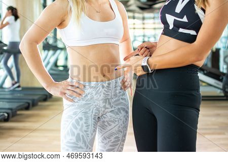 Closeup Of Female With Perfect Slim Body And Torso At Gym.