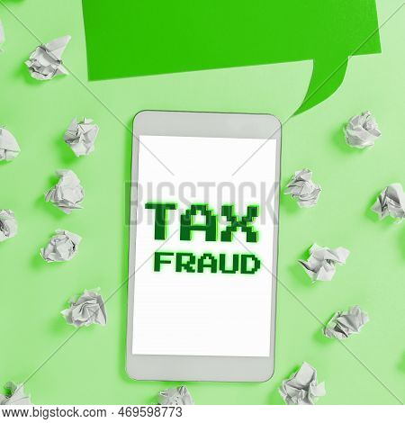 Conceptual Caption Tax Fraud. Word Written On Entails Cheating On A Tax Return In An Attempt To Avoi
