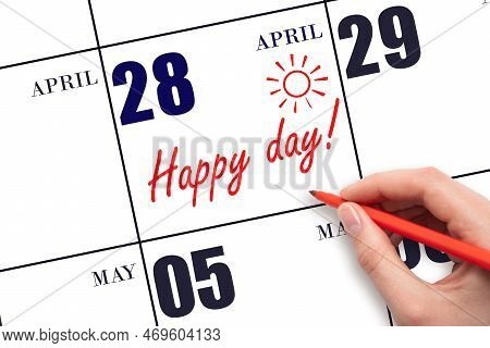 28th Day Of April. Hand Writing The Text Happy Day And Drawing The Sun On The Calendar Date April 28