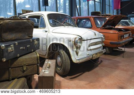 Zelenogorsk, Russia - January 27, 2021: Old Zaporozhets Zaz-965 Peeks Out From Behind A Pile Of Old 