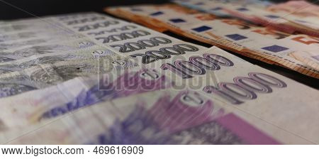 Czech And Euro Banknotes Stacked On Top Of Each Other, Detail Of Czech Banknotes, Photo