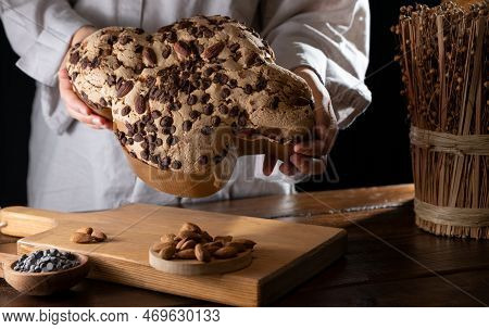 Colomba With Chocolate. Easter Italian Cake With Almonds And Chocolate In The Shape Of A Dove. Festi