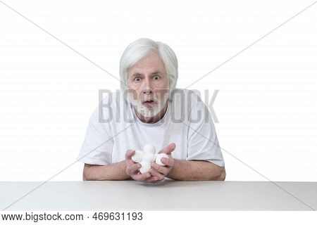 Surprised Or Frightened Old Man Caught Holding His Chicken Eggs