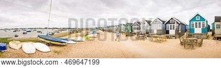 Dorset, Uk - July 07, 2022. Panoramic View Of Christchurch Harbour With A Row Of Wooden Beach Huts. 