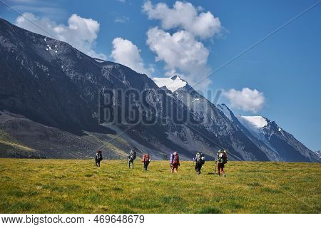 Hiking In The Altai Mountains, Amazing Landscape Of The Valley Of The Mountain Range. Group Hiking,