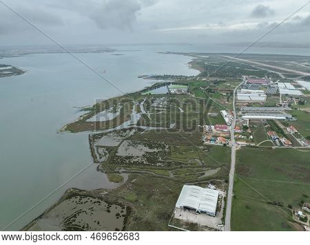 Montijo Cityscape In Portugal. Drone Point Of View. River Tagus In Background