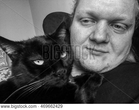 Chomutov, Czechia - November 08, 2022: Black Cat Violka And Me
