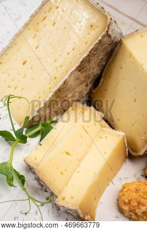 Pieces Of Cheese Tomme De Montagne Or Tomme De Savoie Made From Cow Milk In French Alps