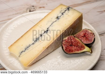 French Semi-soft Cow Milk Cheese Morbier From Franche-comte Region With Thin Black Layer And Strong