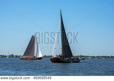 Traditional Frisian Wooden Sailing Ships In A Yearly Competition In The Netherlands