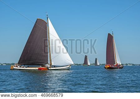 Traditional Frisian Wooden Sailing Ships In A Yearly Competition In The Netherlands