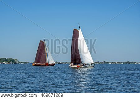 Traditional Frisian Wooden Sailing Ships In A Yearly Competition In The Netherlands