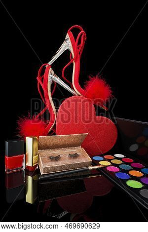 Sexy, Red Strappy High Heel Shoes With Box On A Black Background
