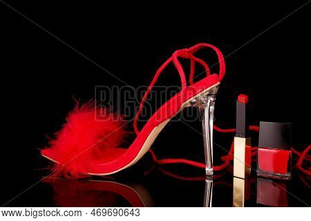 Sexy, Red Strappy High Heel Shoes With Box On A Black Background