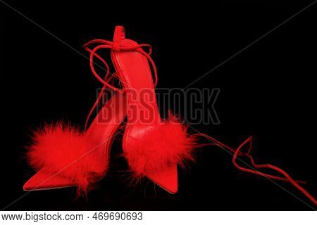 Sexy, Red Strappy High Heel Shoes With Box On A Black Background
