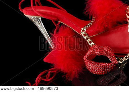 Sexy, Red Strappy High Heel Shoes With Box On A Black Background