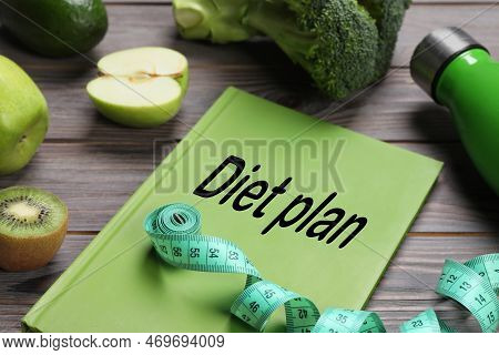 Weight Loss Concept. Composition With Notebook, Measuring Tape And Products On Grey Wooden Table, Cl