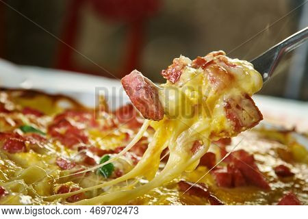 Spaghetti Col Rancetto, Pasta Is Tossed With Fresh Tomatoes, Pancetta, Pecorino Cheese And Marjoram 