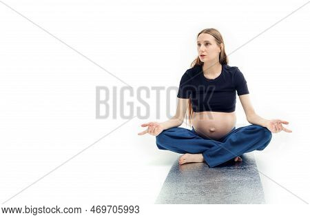 Pleasant Pregnant Woman Posing In Profile And Trying Yoga Young Happy Expectant Relaxing, Thinking A