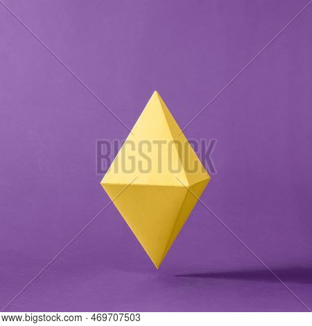 The Symbol Of The Decentralized Virtual Digital Currency Ethereum On A Purple Background In Levitati