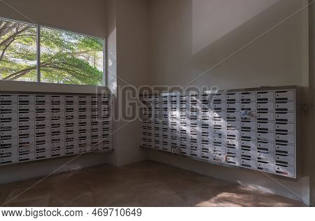 Bangkok, Thailand - 28 Jan, 2023 - Windows View With Big Tree Background In White Mailroom For Resid