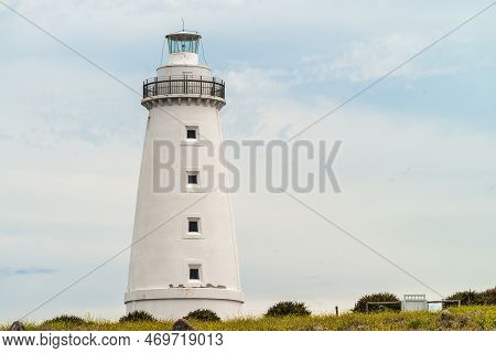 Iconic Cape Willoughby Lighthouse Viewed Against Sky With Clouds On A Day, Kangaroo Island, South Au