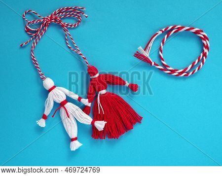 Martisor Red And White Dolls On A Blue Background. Greetings Or Invitation For Holiday Martisor And 