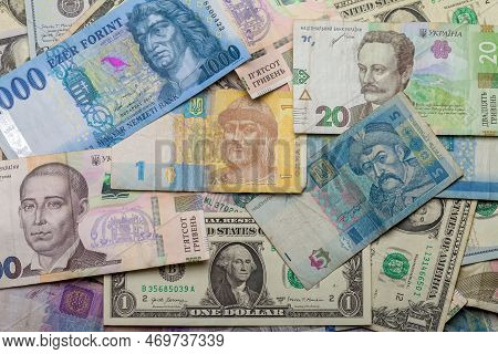Paper Money From Different Countries. Money From Different Countries: Dollars, Hryvnia, Forint