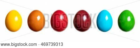 Rainbow Colored Easter Eggs, Group Of Paschal Eggs, In In A Row. Hard Boiled, Colorful Dyed Chicken 