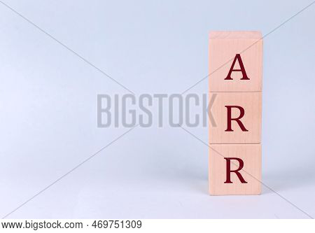Arr On Wooden Cubes On Blue Background
