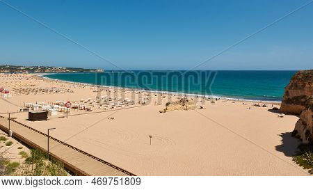 Beautiful View Of The Praia Da Rocha And  Boardwalk Along The Beach. Portimao City, Portugal
