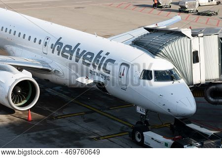 Zurich, Switzerland, January 19, 2023 Helvetic Airways Embraer E-190-e2 Aircraft Is Parking At The G