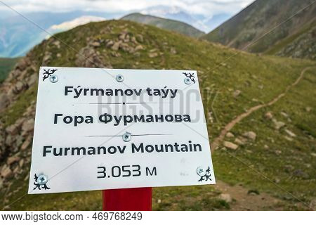Check Point With Signboard On Top Of Furmanov Mountain In Almaty Mountains Of Kazakhstan Nature
