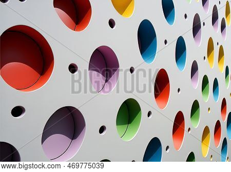 Colored Round Holes On Light Gray Wall. Abstract Bright Background. 3d Digital Illustration. Differe