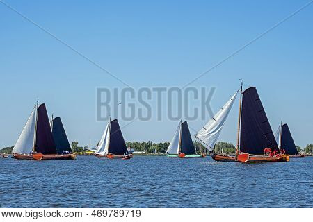 Traditional Frisian Wooden Sailing Ships In A Yearly Competition In The Netherlands
