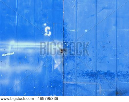Damaged Blue Metal Sheet With Lock, Latch And Hinge. Grunge Metal Texture Background. Architecture A
