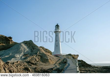 Castle Point Lighthouse And Coastline On Wairarapa Coast In New Zealand.
