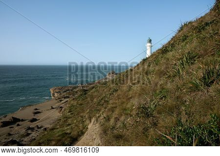 Castle Point Lighthouse And Coastline On Wairarapa Coast In New Zealand.
