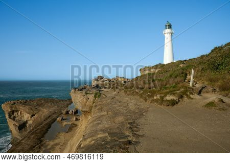 Castle Point Lighthouse And Coastline On Wairarapa Coast In New Zealand.